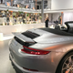 Illustration for article titled This Couple Topped Your Wildest Dreams By Getting Married In A Porsche Showroom